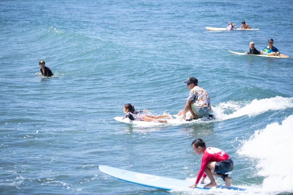 Surf camp at breakwall in Lahaina, Maui