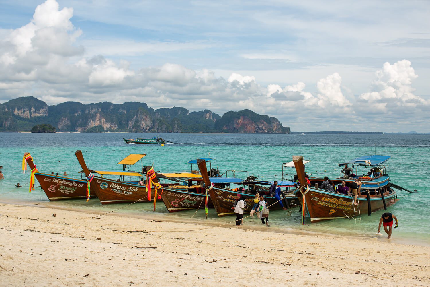 Riding a longtail boat, one of the best things to do in Ao Nang, Thailand