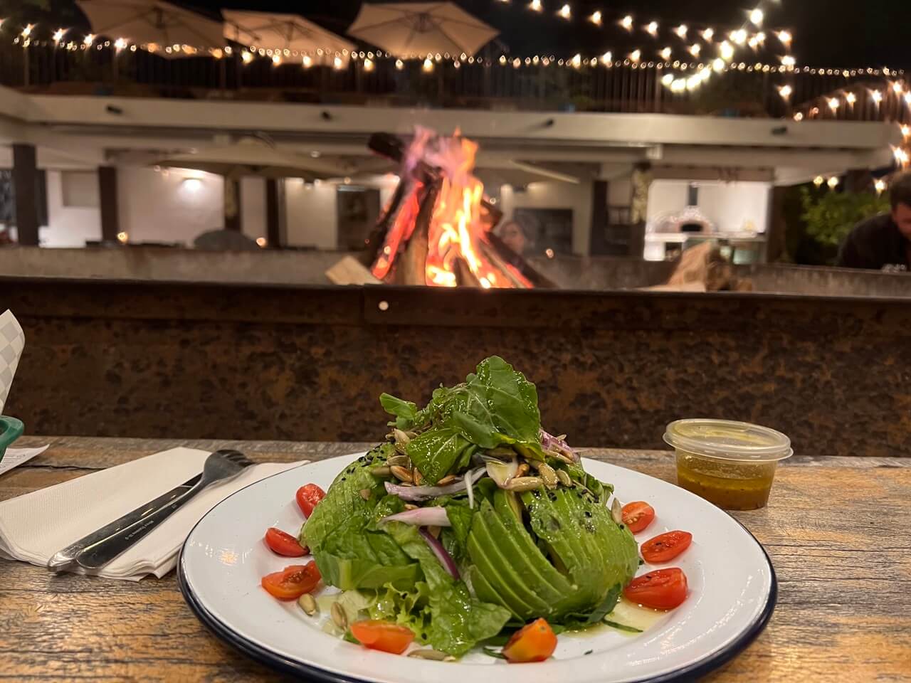 Avocado salad in front of a fire 